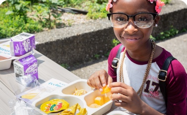 Little girl with healthy lunch